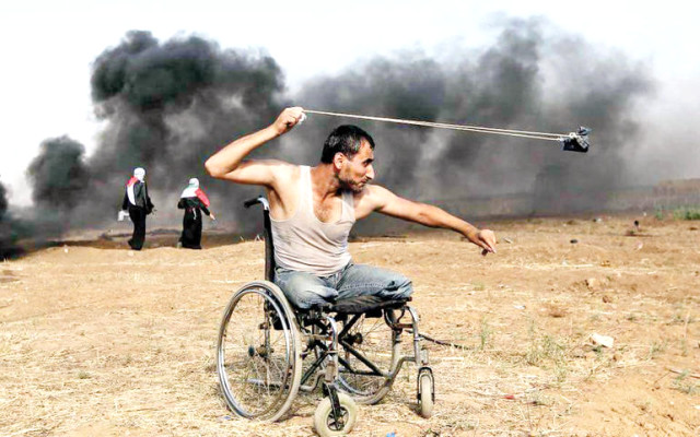 Tekerlekli Sandalyesiyle İsrail'e Kafa Tutan Direnişin Sembol İsmi de Şehit Oldu
