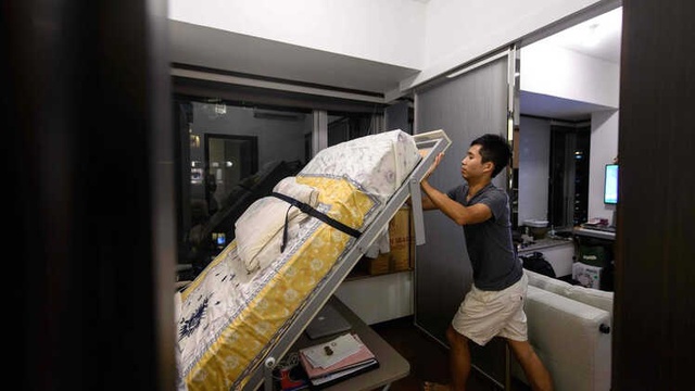 Fotoğraflarla: Hong Kong'da 20 Metrekarelik Cüce Dairelerdeki Yaşamlar