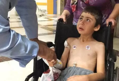 Halı Yıkayan Çocuk, Başına İsabet Eden Mermiyle Yaralandı