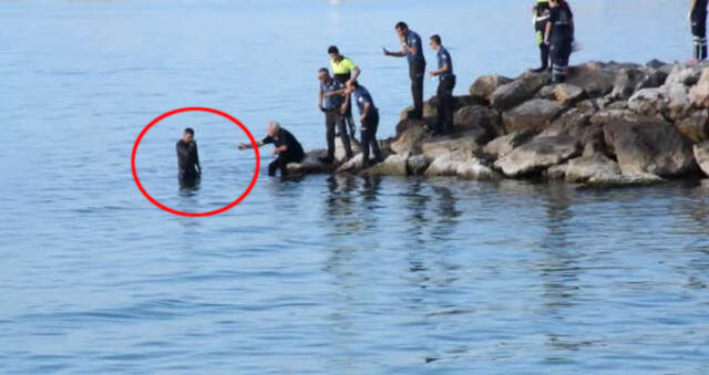 Cam Parçasıyla Boynunu Kesip Denize Atlayan Genci, Suya Atlayan Polis Kurtardı Cam Parçasıyla Boynunu Kesip Denize Atlayan Genci, Üniformasıyla Suya Giren Polis Kurtardı