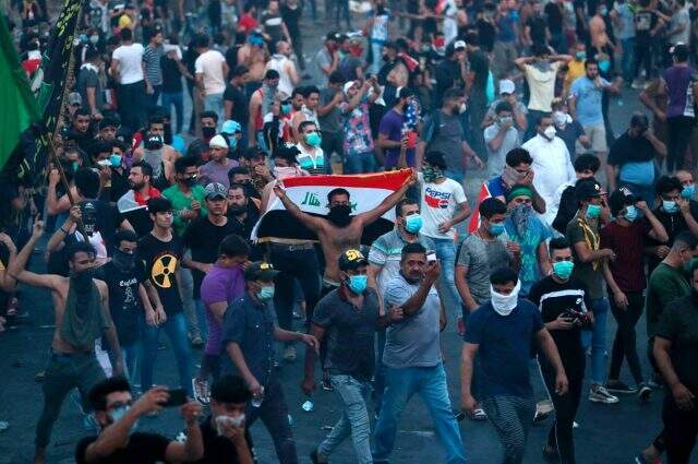 Irak'ta hükümet karşıtı protestolarda ölü sayısı 50'ye çıktı Irak'ta hükümet karşıtı protestolarda ölü sayısı 50'ye çıktı
