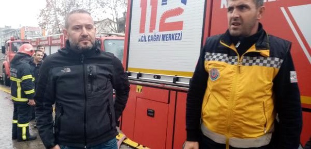 Yanan evde mahsur kalan kadını taksi şoförü kurtardı