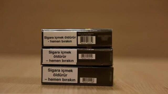 Tek tip olan yeni sigara paketlerinde zifir, nikotin ve karbonmonoksit detayı unutuldu