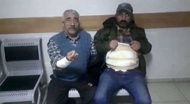 Kendisinden ayrılmak isteyen eşini darp eden koca, ailesini de kaynar su dökerek yaktı