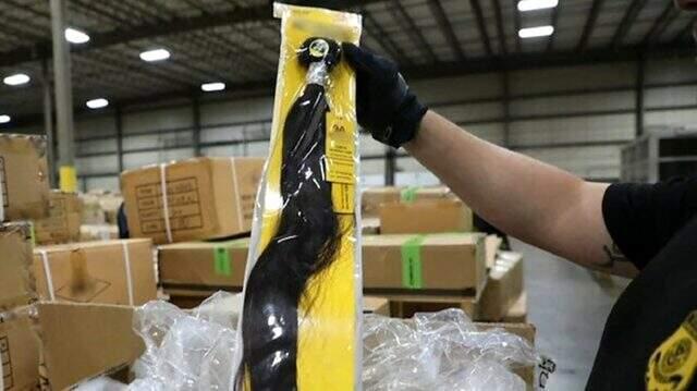 Uygur Türklerine yaptırılan 13 tonluk üründe insan saçı tespit edildi