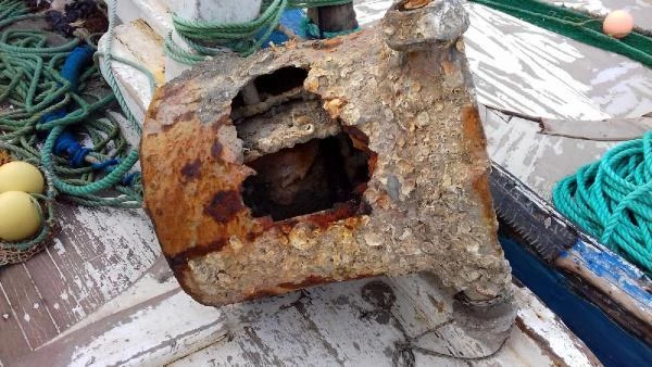 Bodrum'da balıkçı ağlarına 200 kilogram mayın parçası takıldı