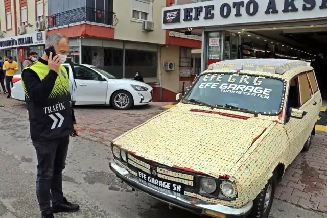 Aracını okey taşlarıyla kaplayıp trafiğe çıkan milyonere, polisten çifte okey