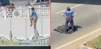 Genç kızın intiharını önleyen polisler, yere çelik yeleklerini serdi