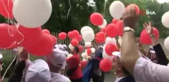 Berlin'de 15 Temmuz şehitlerinin adının yazılı olduğu balonlar gökyüzüne bırakıldı