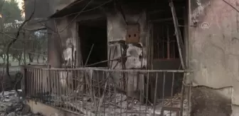 Bakan Kurum, orman yangınında zarar gören alanlarda incelemeler yaptı