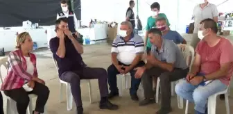 Bakanlar Kurum ile Karaismailoğlu yangından hasar gören yerleşim yerlerini inceledi