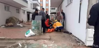 Osmancık'ta şiddetli rüzgar inşaat halindeki bir binanın camını kırdı: 1 yaralı