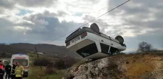 Takla atan araç taşlık alana düştü: 1 yaralı