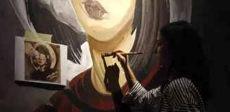 Duvarlar, genç sanatçının fırça darbeleriyle güzelleşiyor