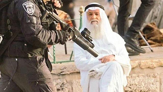 İsrail polisinin karşısında sakince oturan Filistinli, gündem olan fotoğrafın hikayesini anlattı İsrail polisinin karşısında sakince oturan Filistinli, gündem olan fotoğrafın hikayesini anlattı