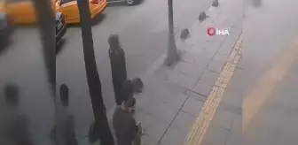 Yolda yürüyen kadını iterek böyle düşürdü, hiçbir şey yokmuş gibi yoluna devam etti