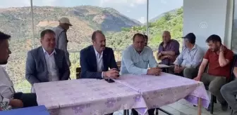 MHP'li Osmanağaoğlu doludan zarar gören mahalleyi ziyaret etti