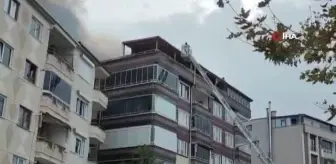 6 katlı binanın çatısında çıkan yangın paniğe neden oldu