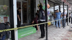 Eşini çalıştığı markette öldürüp aynı silahla intihar etti