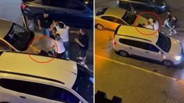 Trafikte dehşete düşüren görüntü! İki araç arasına sıkıştırdığı şahsı böyle darbetti