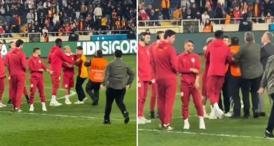 Maç öncesi olay: Sahaya giren bir taraftar, Galatasaraylı futbolcuların arasına daldı