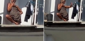 Bina bombaların hedefi oldu, genç kadın hiçbir şey olmamış gibi davrandı