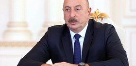 Başörtüsü yasağına tepki gösteren Oktay Saral’a Azerbaycan’dan yanıt