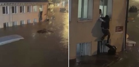 Sarıyer’de sel sularının ortasında kaldı, canını cam pencereye tırmanarak kurtardı
