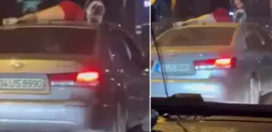 Seyir halindeki otomobilin tavanında twerk yapmaya çalıştı