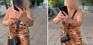 Kedileri besleyen kadın, insanların sokaktan geçmesine izin vermedi