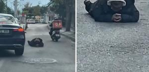 Dünya umurunda değil Yolun ortasına uzanıp yaptığına bakın