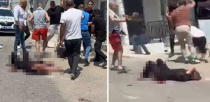 Eşini sokak ortasında bıçaklayarak öldüren adama linç girişimi
