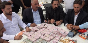 Damada yaklaşık 20 milyon TL, geline kilolarca altın takıldı