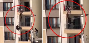 Balkondan düşmek üzere olan çocuğu korkuluklara tırmanarak kurtardı