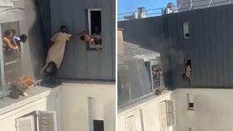 Kahraman kapıcı, yanan binanın 6. katından dört bebeği canını hiçe sayarak kurtardı