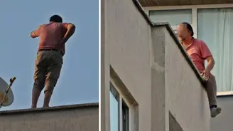 Eşine kızıp çatıya çıktı, ekiplere köşe kapmaca oynattı