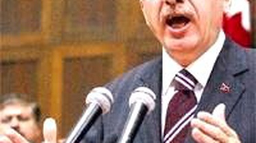 Erbakan'dan AK Parti'ye 'Karikatürlü' Muhalefet