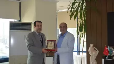 Başkan Koç'a Plaket