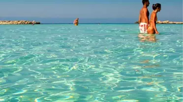 Sıcak Hava Kavururken, Konak'ta Beş Günde Yüzlerce Kişi Denizle Buluştu