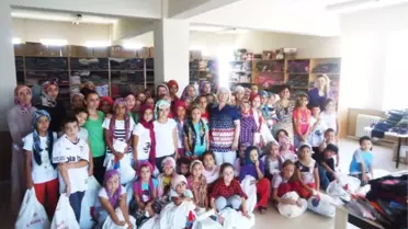 Burhaniye'de İhtiyaç Sahibi Çocuklar Sevindirildi