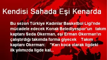 Kendisi Sahada Eşi Kenarda