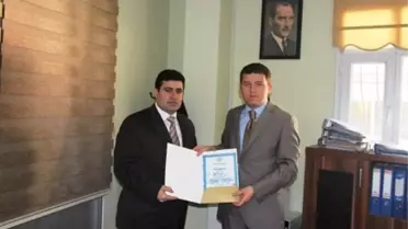 Cizre Kaymakamı Koca'dan Vergi Dairesi Müdürü Şimşek'e Başarı Belgesi