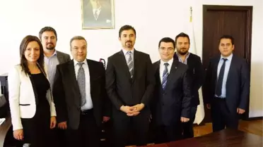 Mugiad Yönetimi, Rektör Vekili Erdil'i Makamında Ziyaret Etti