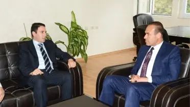 Başkan Sözlü, Kozan Kaymakamı Oral'ı Ziyaret Etti