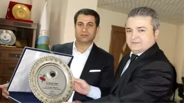 Hatso'dan İş Adamı Ölmez'e Plaket