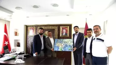 Başkan Tutal'a İmh'den Ziyaret