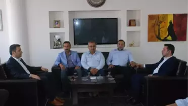 Başkan Eroğlu'ndan MHP'ye Ziyaret