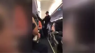 Chıcago)- United Hava Yolları, Yolcusunu Sürükleyerek Çıkardı