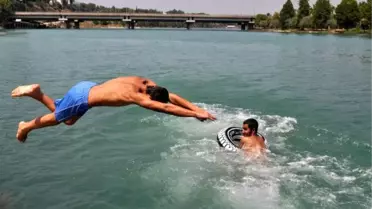 Dha Yurt: Adana'da Yüksek Neminde Etkisiyle Hava Sıcaklığı 40 Derece Hissedildi.