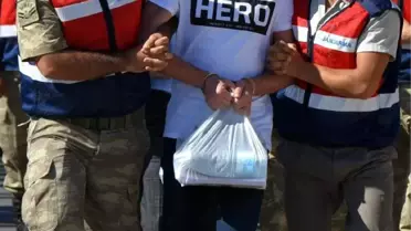 Son Dakika! 'Hero' Tişörtü Giyen Darbeciye ve Ablasına Dava Açıldı, 5 Görevli Açığa Alındı